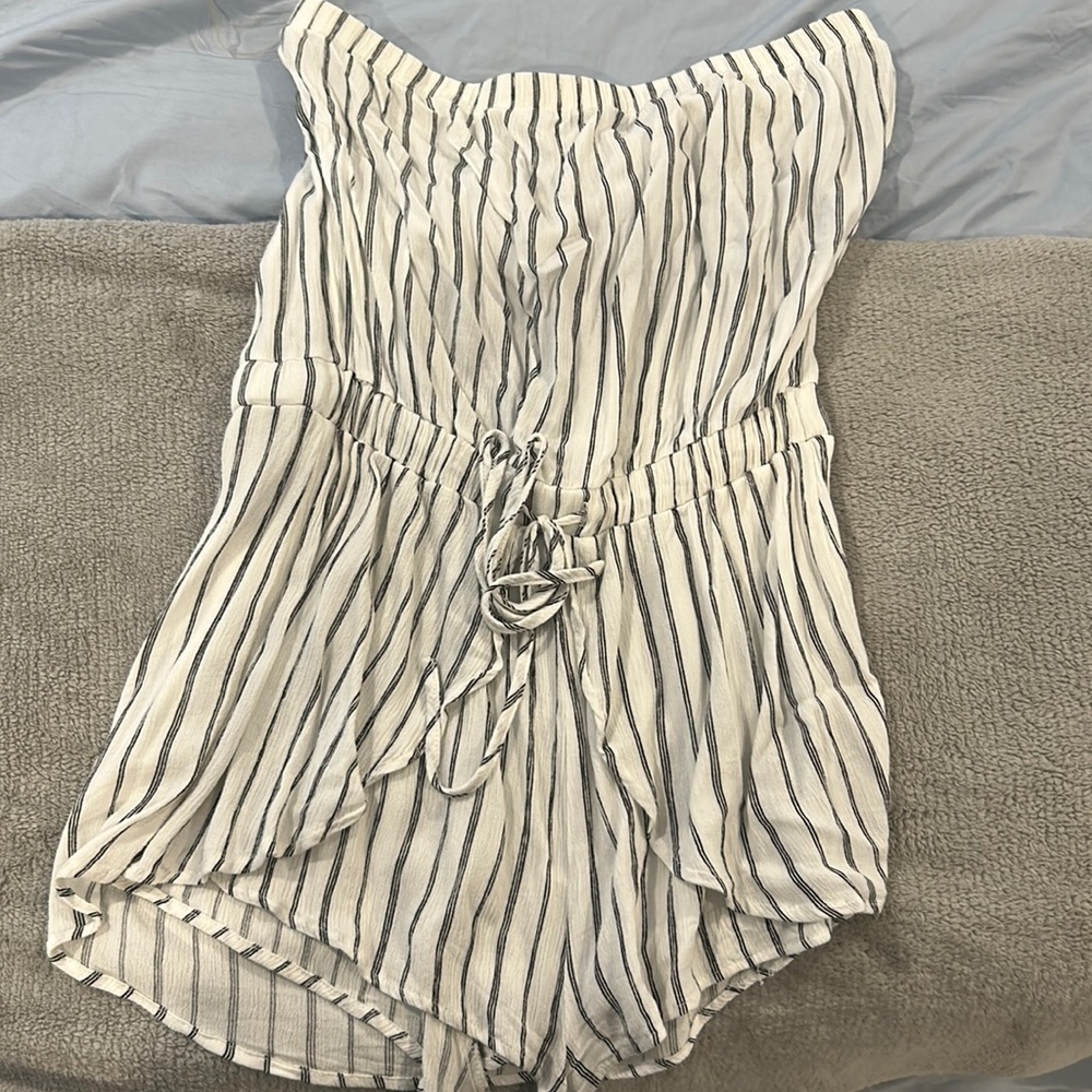 perfect condition, worn once, true to size, ties in the front,